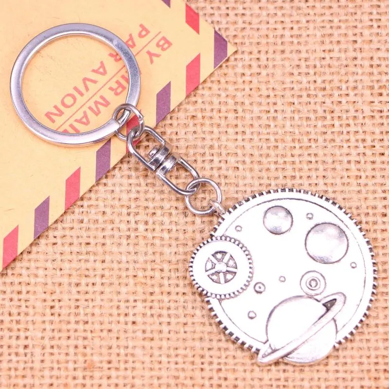 Nyckelringar 20st Fashion Keychain 37 mm Solar System Galaxy Pendants Diy Men smycken bil Key Chain Ring Holder Souvenir för gåva