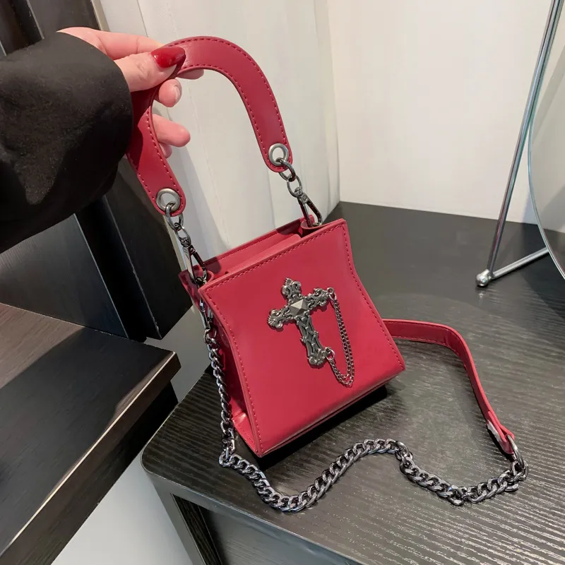 Factory wholesale ladies shoulder bag 4 colors street rivet mobile phone bag daily Joker solid color leather handbag trend skull mini coin purse 3150#