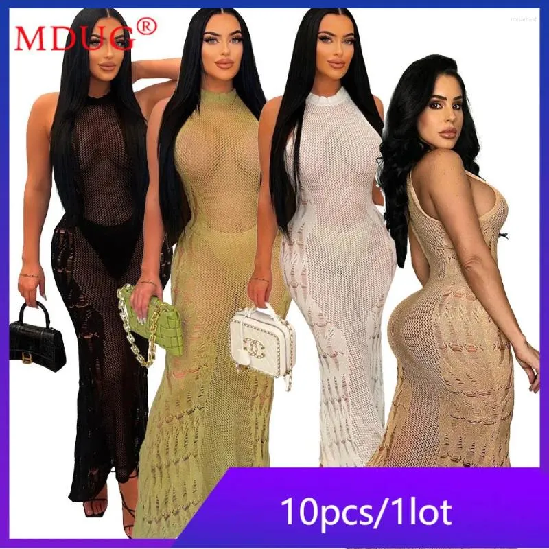 Robes décontractées 10pcs gros tricot pour femmes sexy évider sans manches longues robes mode solide voir à travers club wear m11001