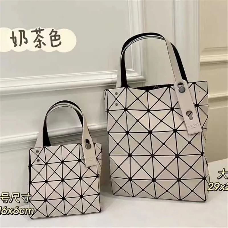 Bolsas de diseñador para la venta de liquidación para mujeres cuatro vidas 2024 bolso de bolso nuevo mini caja tres mansiones de moda de cuadrícula lingge