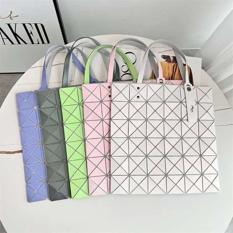 Designerbeutel für Frauen Freigabe Verkauf Damen Japanische Original geometrische Fabrik 2024 lebenslange neue modische Zhenjin -Umhängetasche Diamant Sechs Grid Tote Handtasche