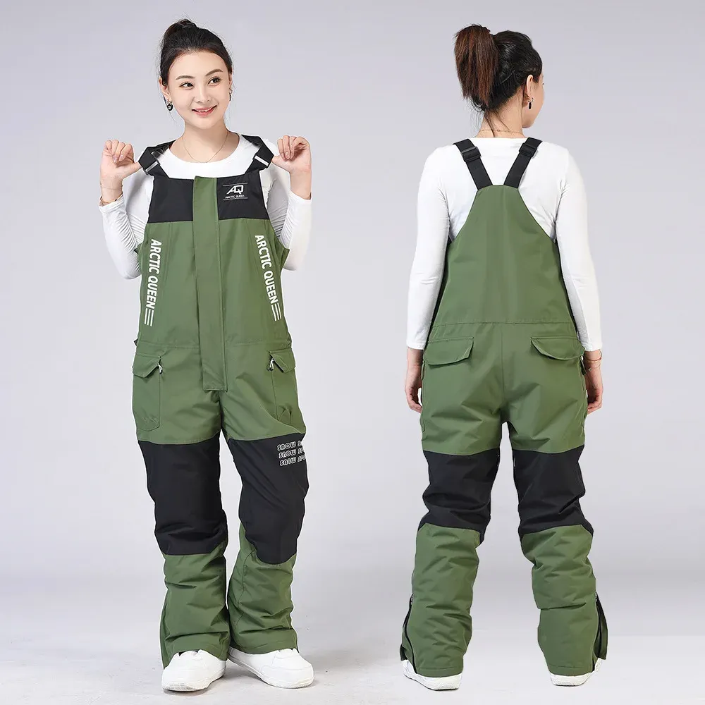 Polen Ski Jumpsuit voor mannen en vrouwen Winter Outdoor Warm Winddichte waterdichte waterdichte snowboarden Overalls Ademende Ski -slabbetjes broek