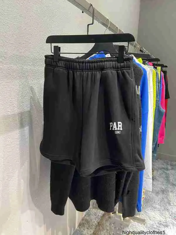 Designer INS 22SS Summer Paris Lekstagade herr- och kvinnors casual lösa shorts RP2T