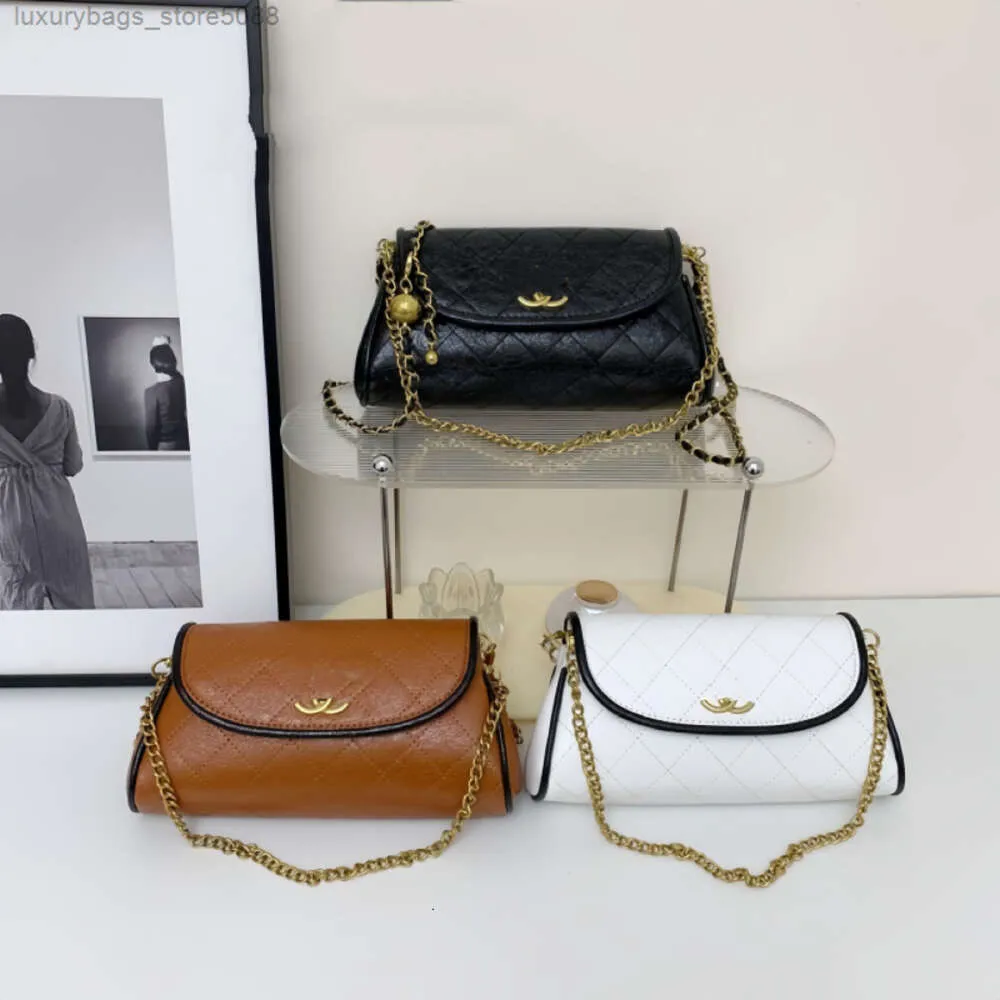 Läderhandväska designer säljer märkesväskor till 50% rabatt het populära kvinnors väska ny en axel mångsidig underarm
