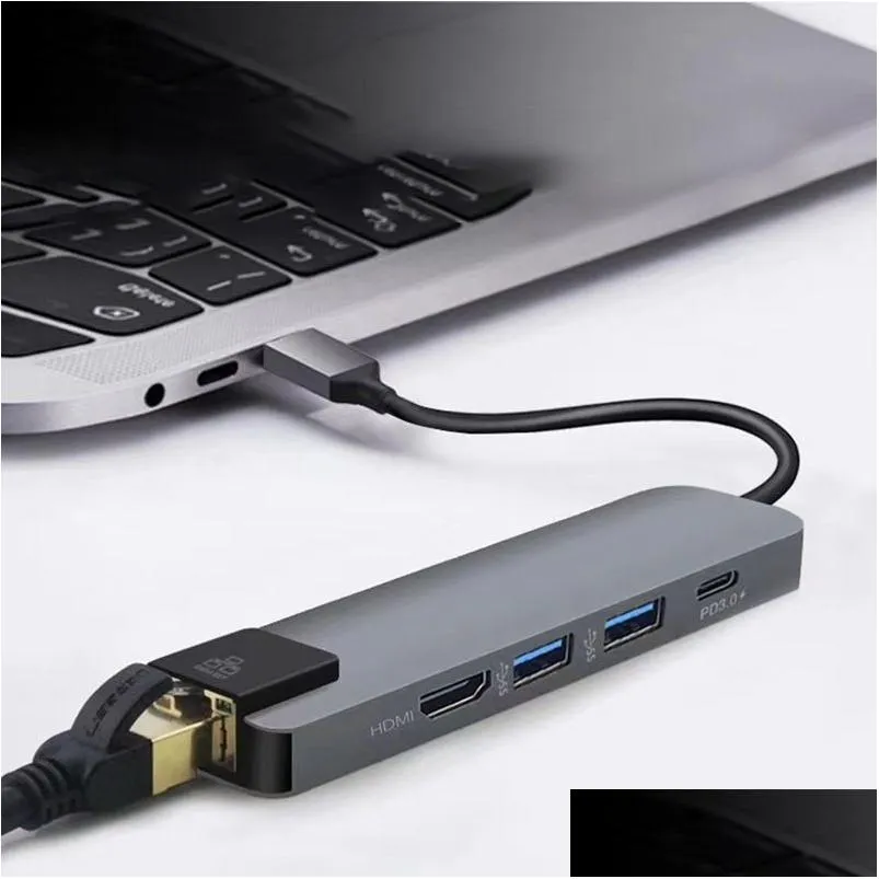 USB Hubs C à AddusB3.0ADDRJ45ADDDPD Adaptateur 5 dans 1 MTI Port Gigabit LAN Prise en charge 4K Aluminium Alloy Dock Station Station de chute de gamme COMPU OTK31