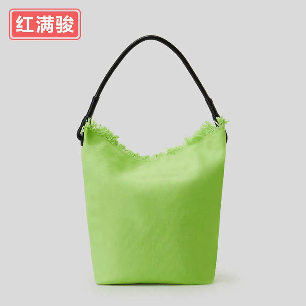 East Gate Canvas getragener Quasten -Eimer -Bag Frauen modische Kontrastfarbe Handtasche Mode einfache Umhängetasche 240402