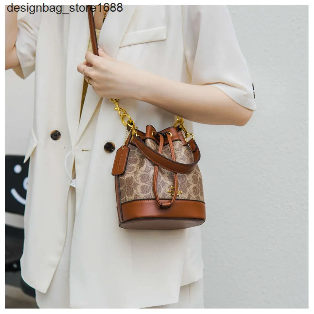 Дизайнер сумок в ковшах классический стиль для женщин Новые женские модные и модные печатные поперечные варианты высококачественные универсальные плечи