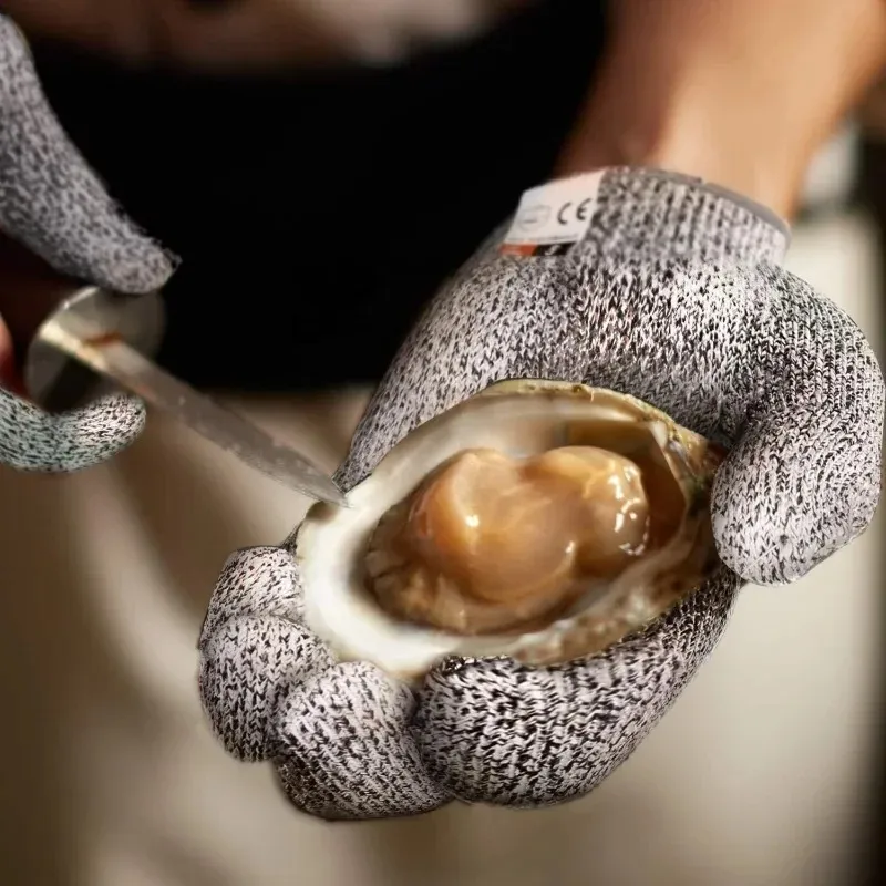 Anti-geschnittene Outdoor-Fischerei Handschuhe Messer geschnittene Schutzschutzfischereiungshandschuhe Stahldrahtnetzhandschuhe Fischereiwerkzeuge Knipfel-Widerstandshandschuhe