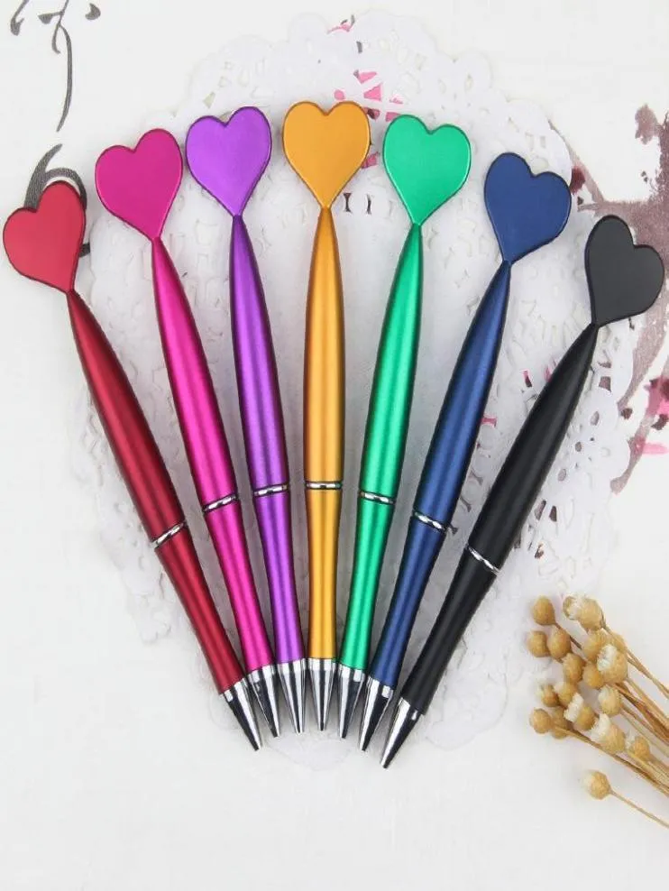 60pcs Kawaii Beyaz Kalem Metalik Doku Plastik Kalp Rollerball Pens Okul Ofis Malzemeleri Kırtasiye Eğlenceli Ofis Şakaları16110669