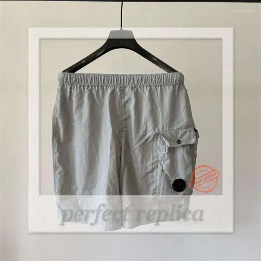 Shorts CP Shorts Shorts Shorts Shorts Shorts Summer di alta qualità CP Pantaloni da lavoro casual Nylon Essiccazione rapida con tasca sciolta spiaggia 831