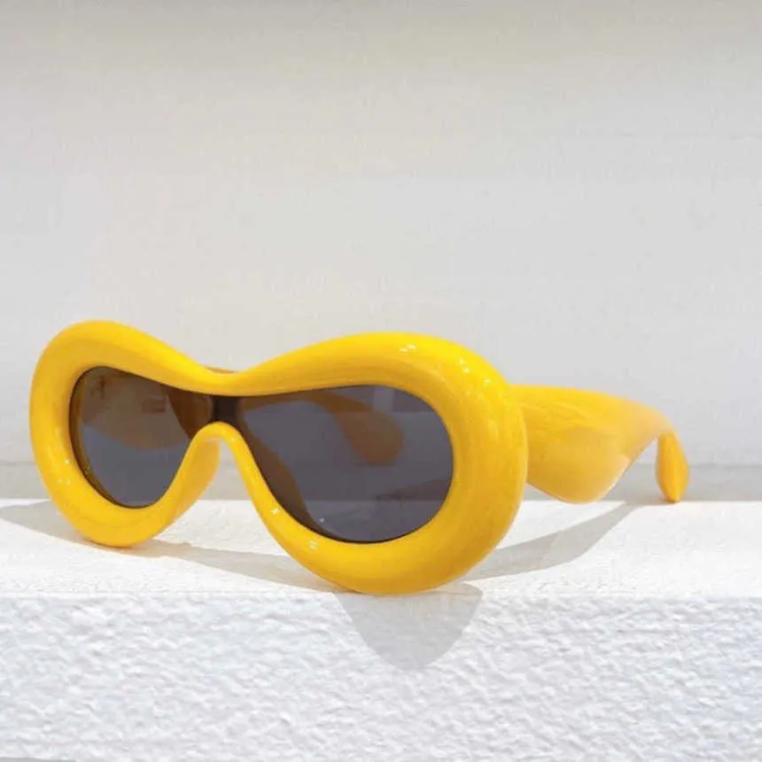 2024 Ny högkvalitativ lyxdesigner solglasögon Nya Luoyis bröd Uppblåsbara padda nettor röda solglasögon kvinnliga LW40099