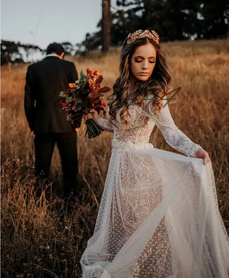 Vestiti splendidi abiti da sposa avorio a maniche lunghe vede attraverso abiti da sposa in tulle in pizzo sexy senza schienale.