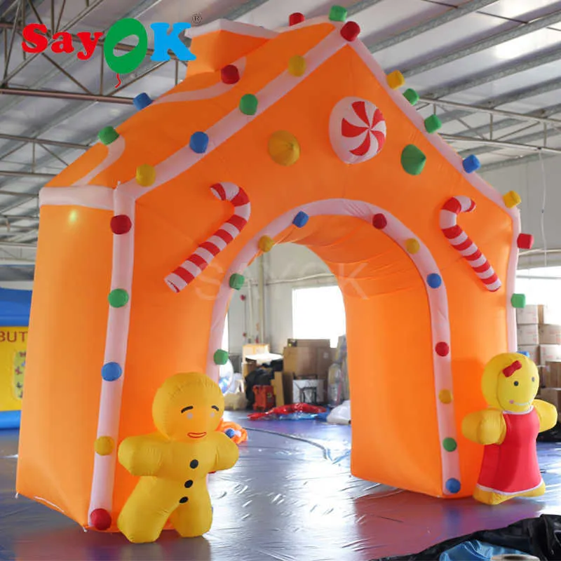 Arco inflable de decoración navideña LED de 4m al por mayor con palitos de dulces y linda entrada de arco de Navidad inflable de puerta con soplador