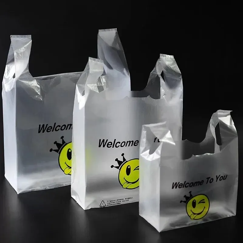 50st/pack 9 storlekar Utför väskor Smile Presentväska detaljhandelsbutik Livsmedelsaffärer Plastpåsar med handtag matförpackning för plastköpspåsar med handtag