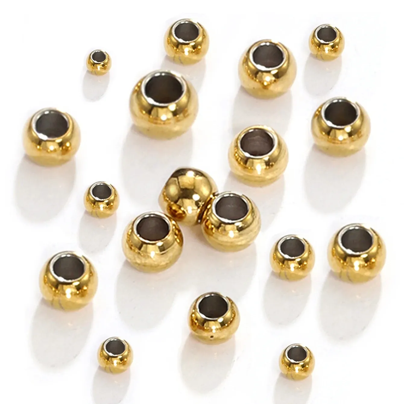 Perlen 100pcs 28 mm Edelstahl Gold Farbabstandshalter Perlen Charme Lose Perlen DIY Armbänder Halskette Perlen für Schmuckherstellung Charme