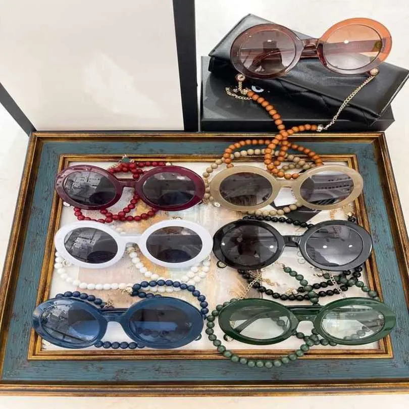 2024 Modna moda luksusowy projektant Nowe okulary przeciwsłoneczne dla mężczyzn i damskich okularów w łańcuchu pereł wiszą