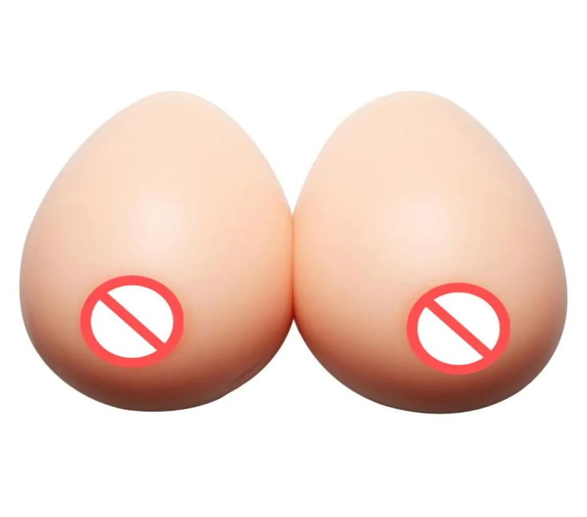 Os peitos de silicone realistas formam próteses peitos falsos de auto adesivo para a drag queen travesti transgênero crossdresser4290334