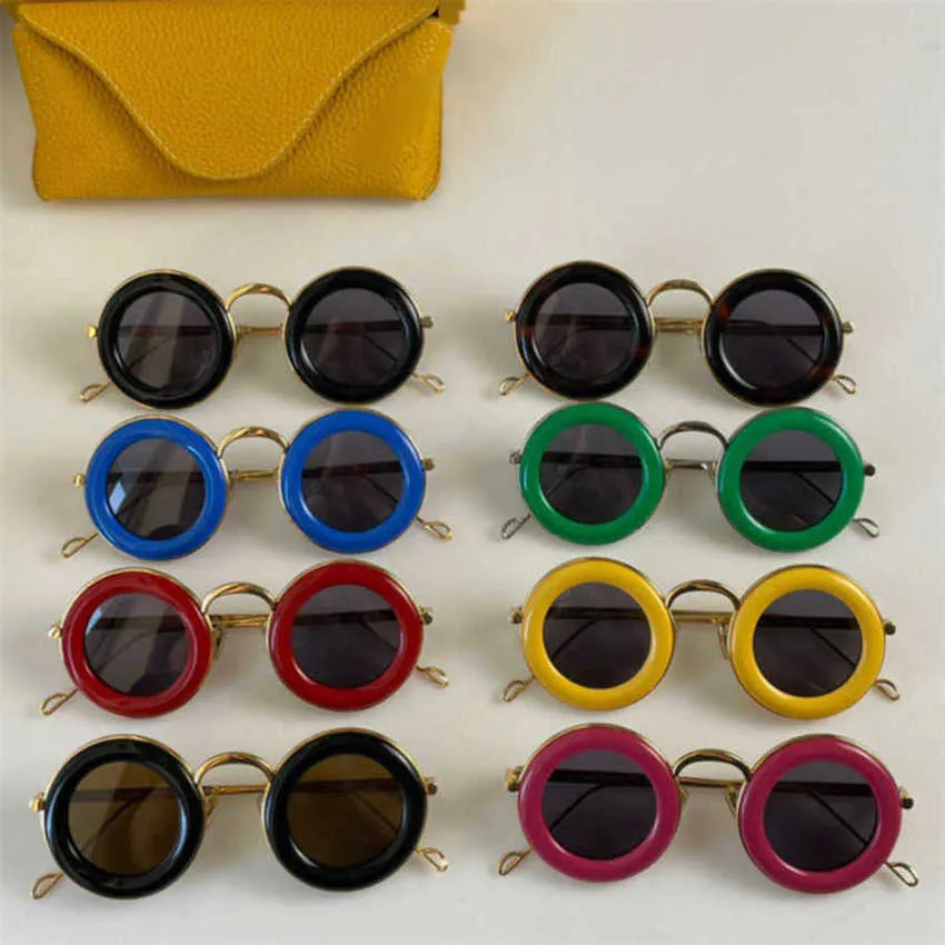 Högkvalitativ fashionabla lyxdesigner New Luo Yijia Round Frame Solglasögon ins net Red Samma geléfärgade solglasögon kvinnor LW40094