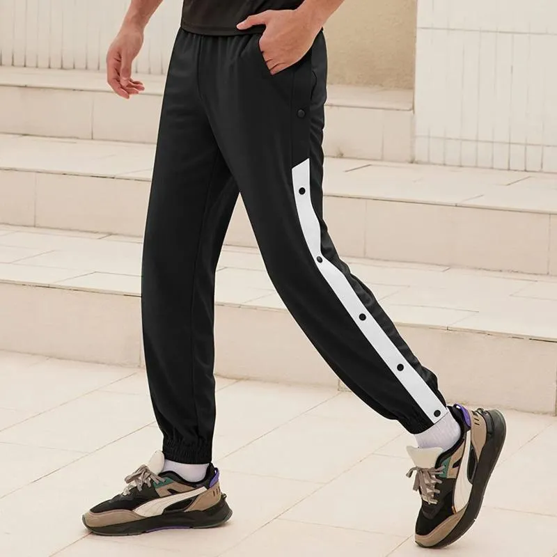 Pantaloni da uomo allenamento casual allenamento atletico joggers pantaloni alla moda per pantaloni allacciati di pallacanestro sport bottoni a strisce