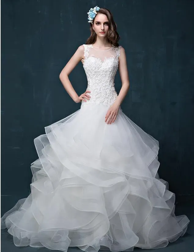 Abiti un nuovo abito da sposa di alta qualità abiti sexy coda spalla cazzo di pizzo bianco applique manuale per perline per perline da sposa abiti da sposa