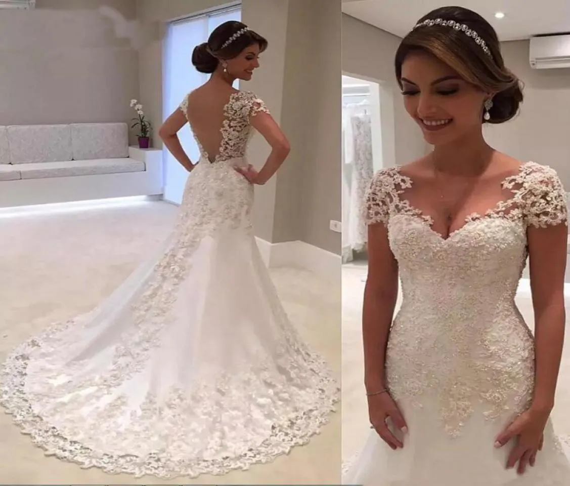 Backless 2021 Lace Appliques Mermaid African Wedding Dresses Gowns Sexy V neck Short Sleeve Beading Pearls Bridal Custom Vestidos 9927669
