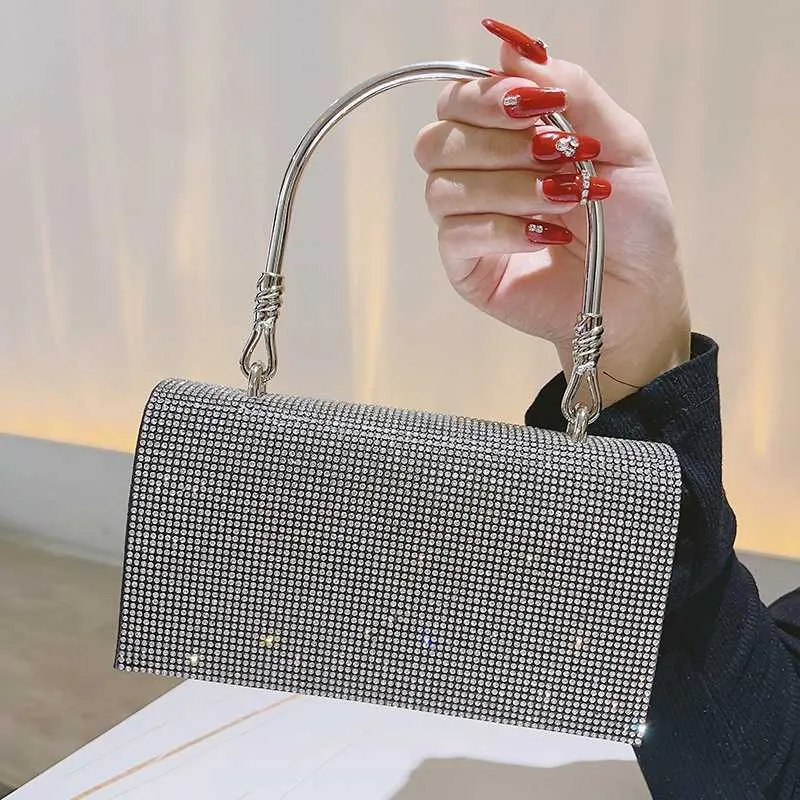 أكياس 2024 Wallte Dinner Handbag Envelope Envelope Magnetic Buckle مقترنة مع لباس المآسور الماس النسائية حقيبة مصمم حقائب مصممة