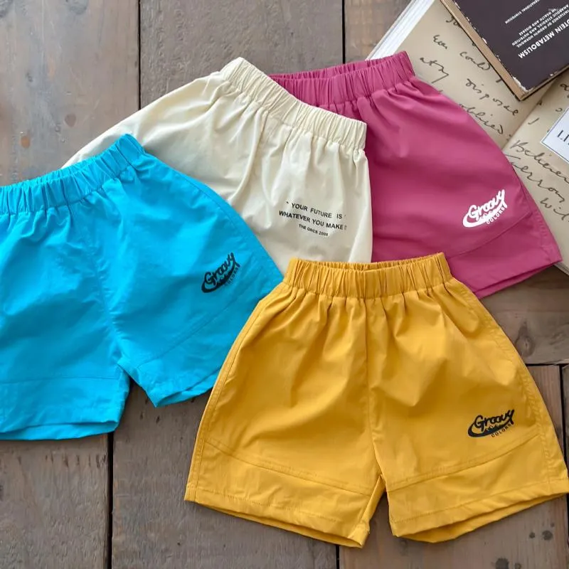 Trousers 2024 Summer Boys' Pants Girls' Shorts Quarter Korean Children's Middle Beach Kids Clothes