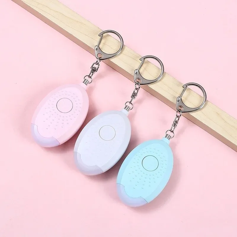 2024 130 dB Sécurité Protéger l'alerte Scream Loud Alarme d'urgence Keychain Sécurité personnelle pour les femmes enfants Elder Girl Alarme d'autodéfense