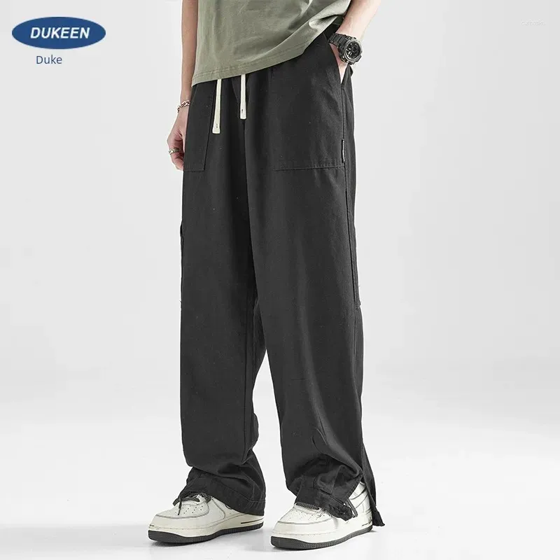 Pantaloni maschili alla moda en high street spring draping work