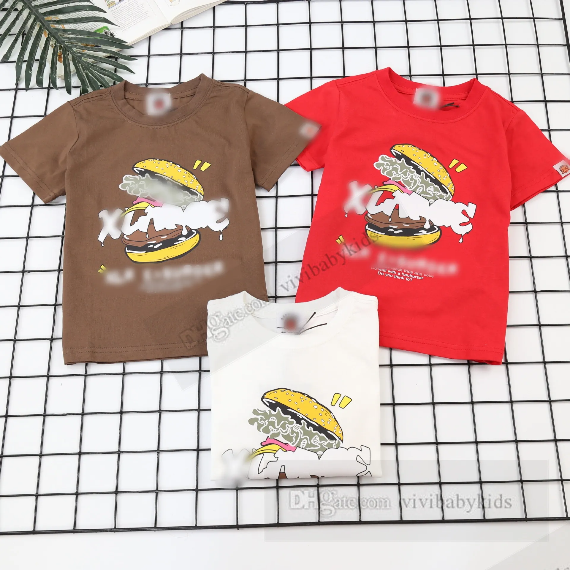 子供コットンTシャツの男の子漫画ハンブルクレタープリント半袖Tシャツ2024キッズデザイナー服サマーガールズルースカジュアルトップZ7507