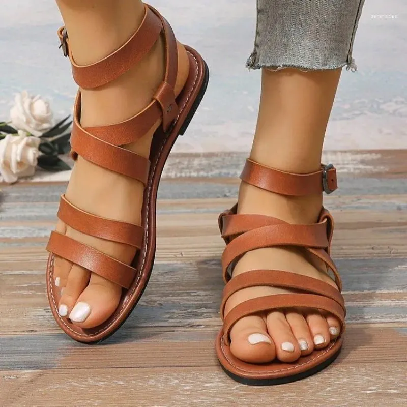 Sandaler 2024 Kvinnor Roman Flat Summer Bekväm och elegant säljande naturlig designersko som erbjuds lågt pris