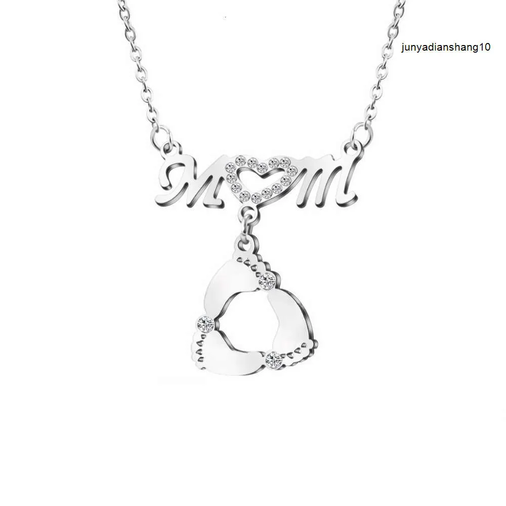 Fashionable Hollow Out Rotating Foot Necklace with Diamond Inlay Stainless Steel Womens Personalized and Minimalist Collarbone Pendant