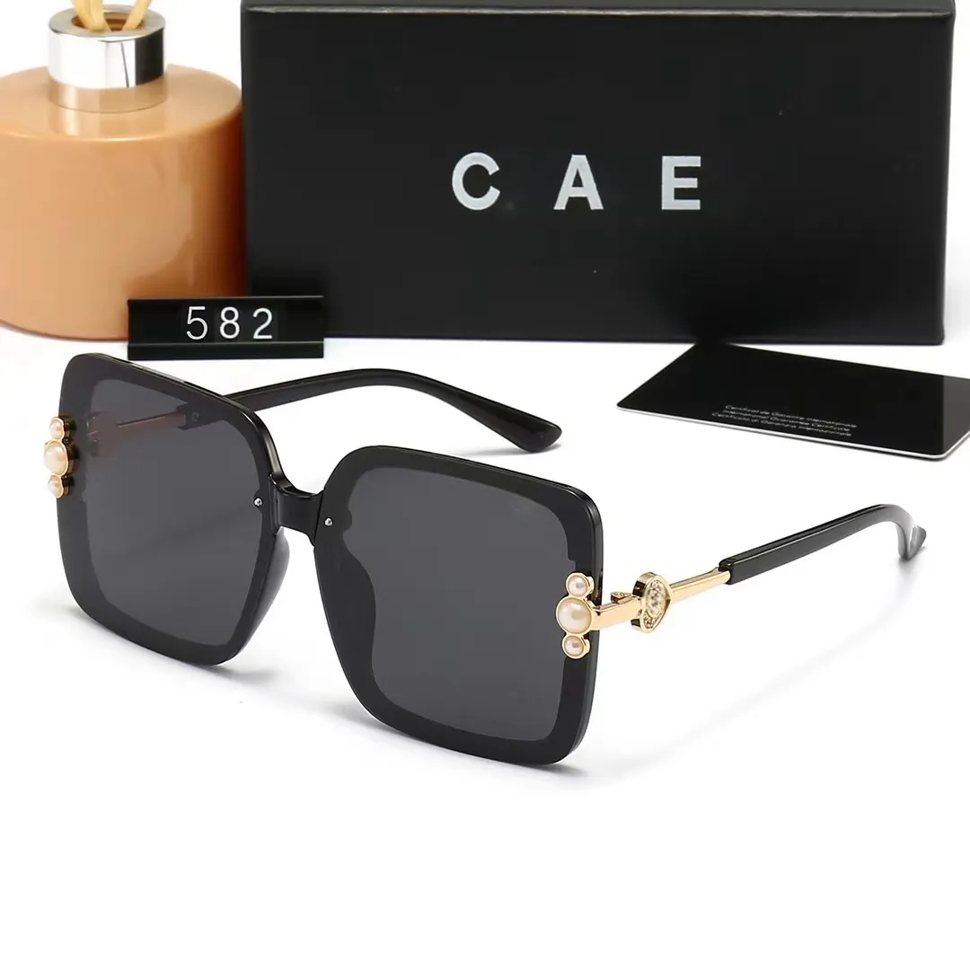 Großhandel Designerin Sonnenbrille Original Brille Outdoor -Schatten Metall Gold Rahmen Gläser Männer Frauen Sonnenbrillen Polaroidglas Objektiv mit Schachtel