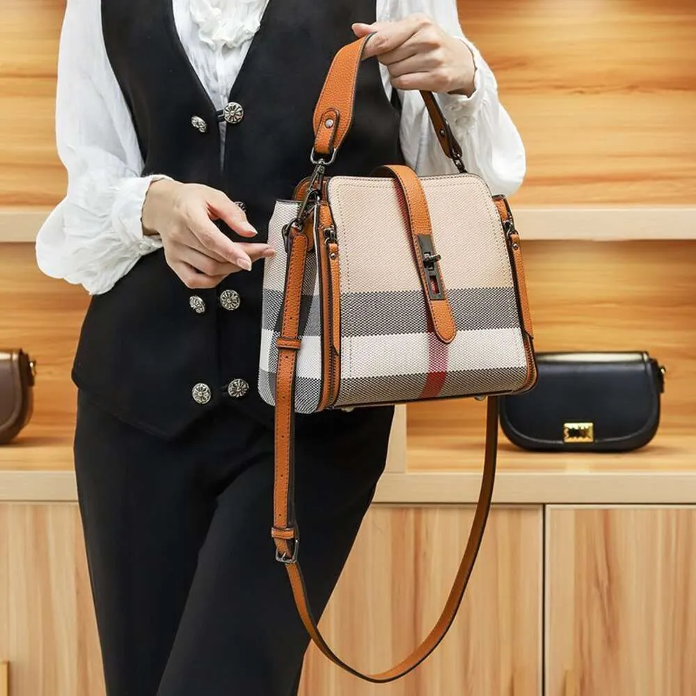 Nieuwe luxe schoudertas Hong Kong merk echte lederen dames tas mode luxe wateremmer veelzijdige handheld één schouder crossbody