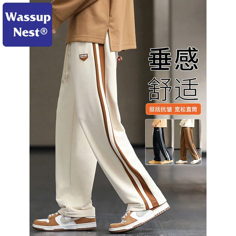 Wassup Nest drapeando calças retas para homens de verão American Casual Loose Sports Casal Fashion