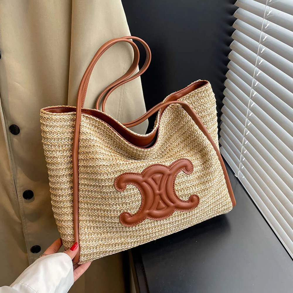 Handväska designer 50% rabatt på heta varumärkesväskor Nya kvinnors väska triumfal på en enda axel stor kapacitet