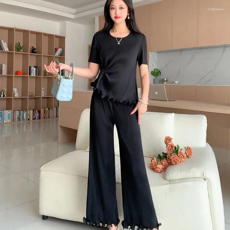 Tweedelige broek voor vrouwen Miyake Fashion Suite Eenvoudig solide informeel veelzijdig temperament Elegante ronde ronde ronde nek korte mouwen blouse brede poot
