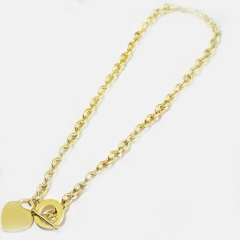 Toppkvalitet 18K Gold Link Cuban Chain Armband Heart Necklace Titanium rostfritt stål Klassiskt modälskare armband diamantmor av pärlkvinnor man smycken gåva