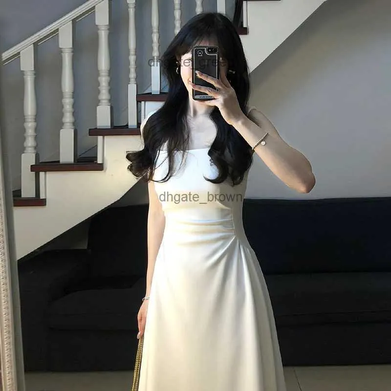 Robe de camisole blanche à la taille française avec un sentiment de luxe Nouvelle robe de fée de la nouvelle 2024 Summer Summer