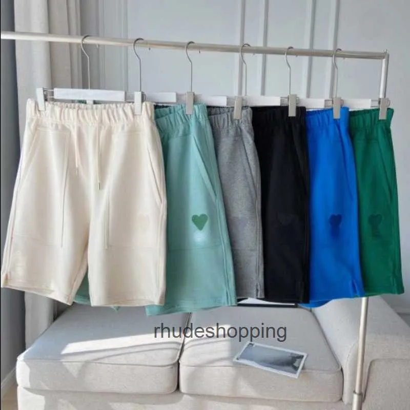 Summer Beach Designer Pants Män Kvinnor Solid Färg älskar broderi Sweatpants Löst par Slacks Drawstring Five-Point Shoets