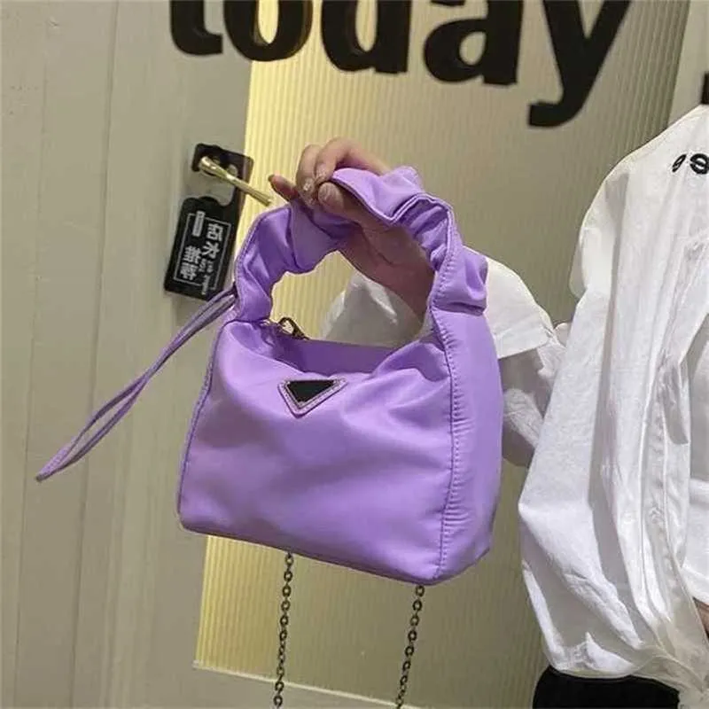 2024 Nouveau concepteur pour femmes crossbody épaule ressentant le sac sous les bras et la version pop portable messager