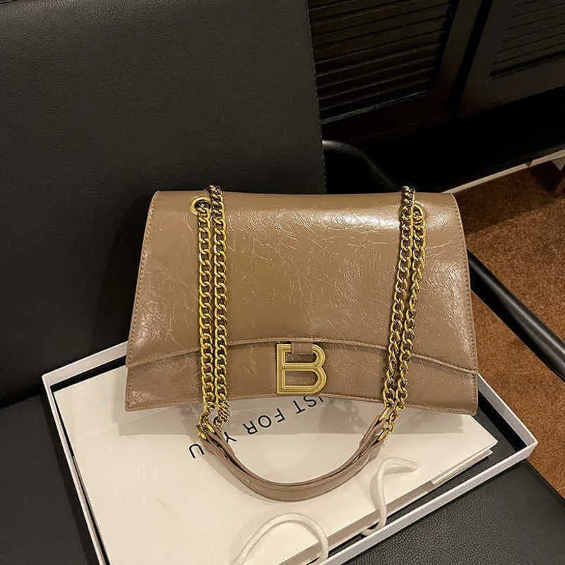 Designer womens handbag Hourglass Early Autumn New Chain Texture Shoulder Hand Grab Cross Body Bag for Women