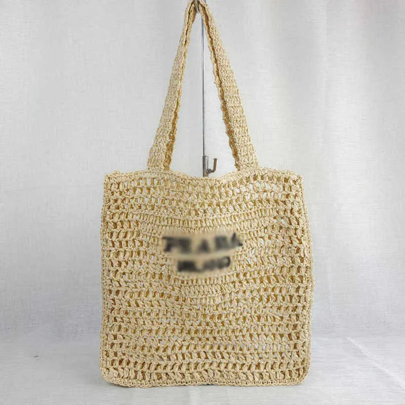 Designer womens handbag Paper rope woven shoulder beach versatile photo taking letter hollowed out bag leisure travel