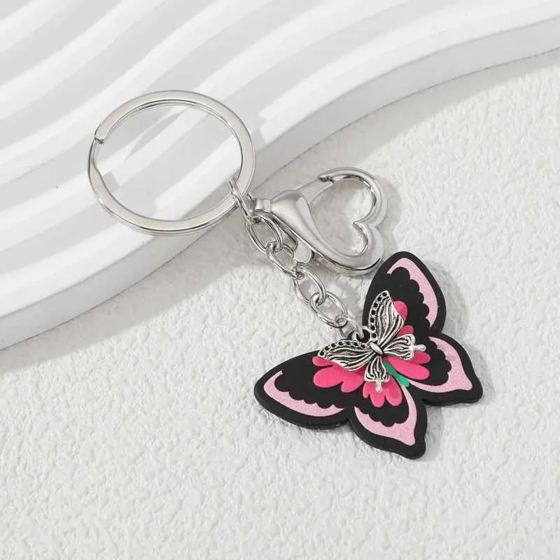 Keychains Lonyards y2k papillon coloré beau coeur rose insecte volant des clés pour les femmes cadeaux d'anniversaire bijoux faits à la main bijoux Q240403