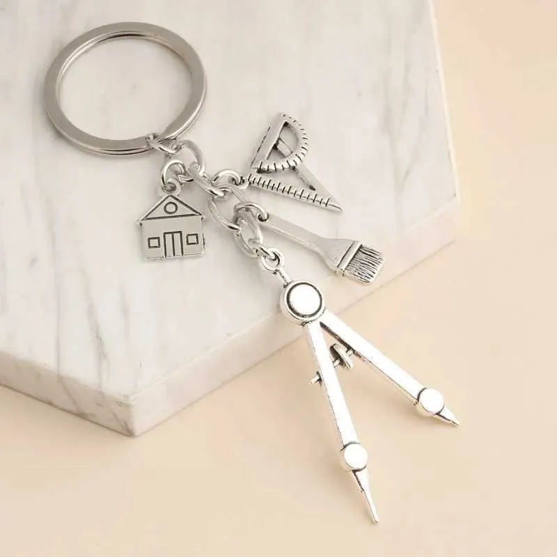 Keychains Lanyards Nieuwe thuissleutelhanger Building Key Ring Driehoekige regel Borstel Borstel Huisketen voor architect Engineer Teken Gifts Sieraden Q240403