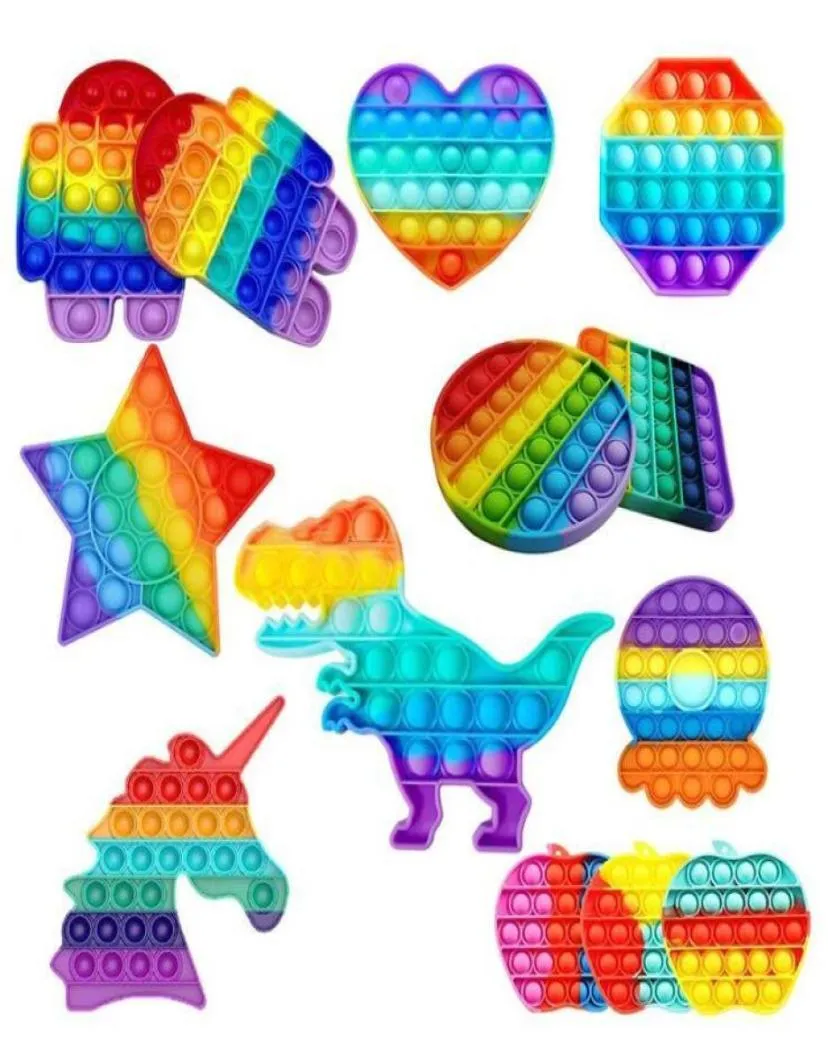 プッシュフィジェットおもちゃ虹色のバブル感覚自閉症特別ニーズストレスリサイバーそれは子供のための感覚おもちゃを絞る8186470