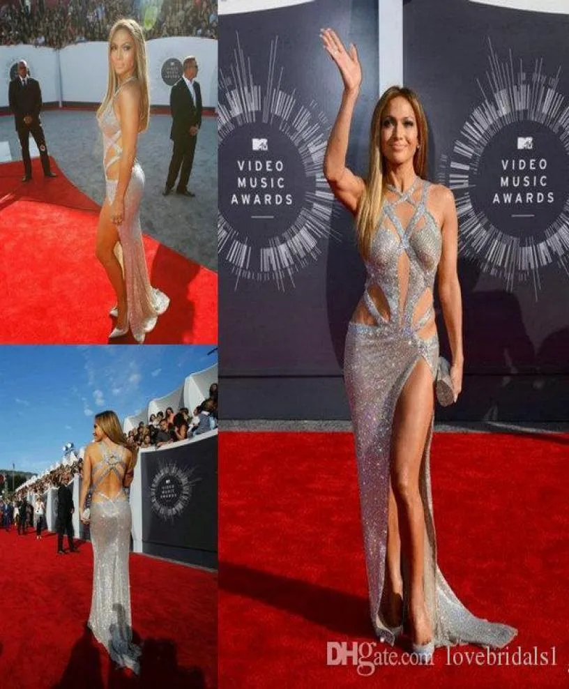 Luksusowe seksowne sukienki wieczorowe z kraksami z paskami krzyżowymi sukienka balowa Jennifer Lopez niedrogie podzielone cekinowe celebrynę Silver Celebrity4706341