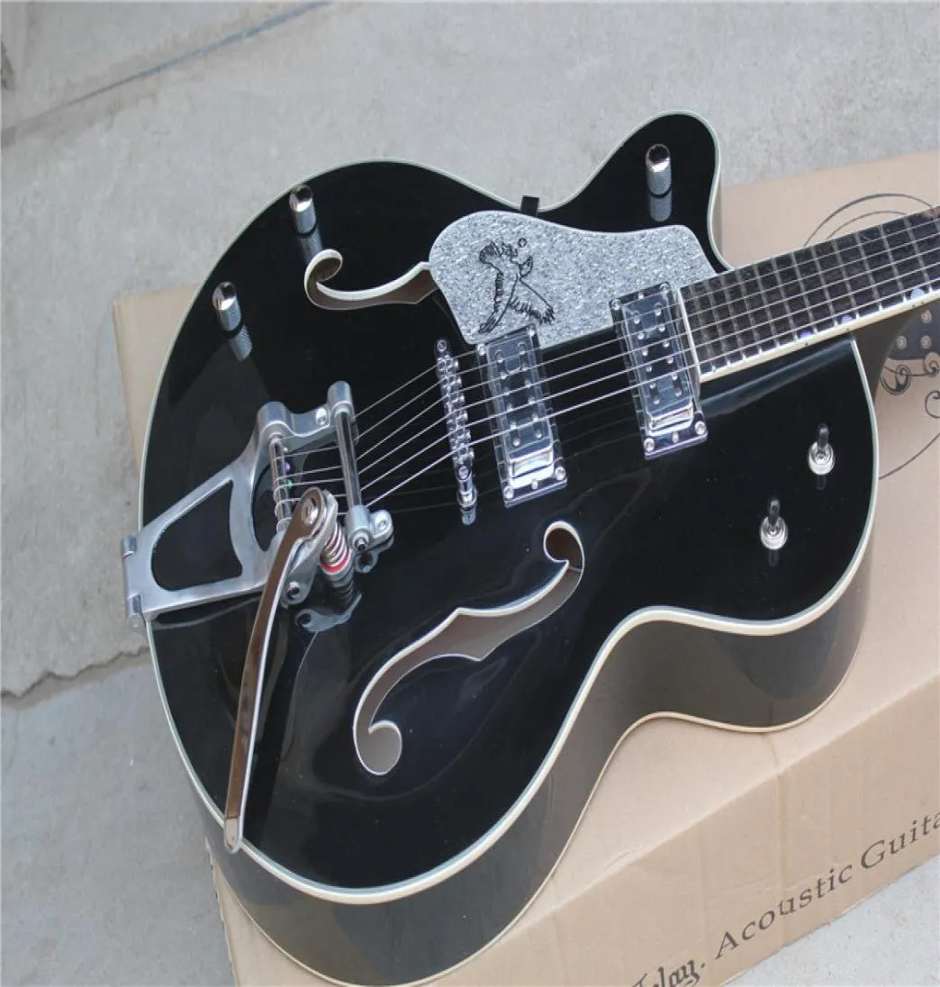 Fabrik benutzerdefinierte linkshändige hohle schwarze E -Gitarre mit Chrome Hardwarestremolo Systemwhite Bindingcan Customized8697144