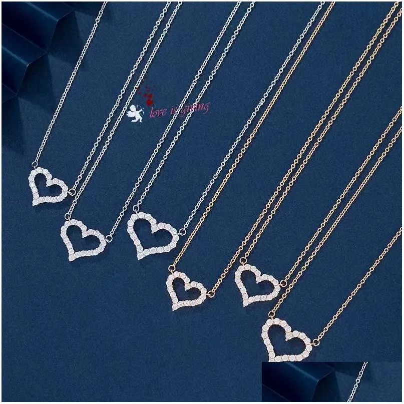 Colliers pendents t Collier sier en forme de coeur taille de cœur FL de la clavicule diamant chaîne de lumière de lumière