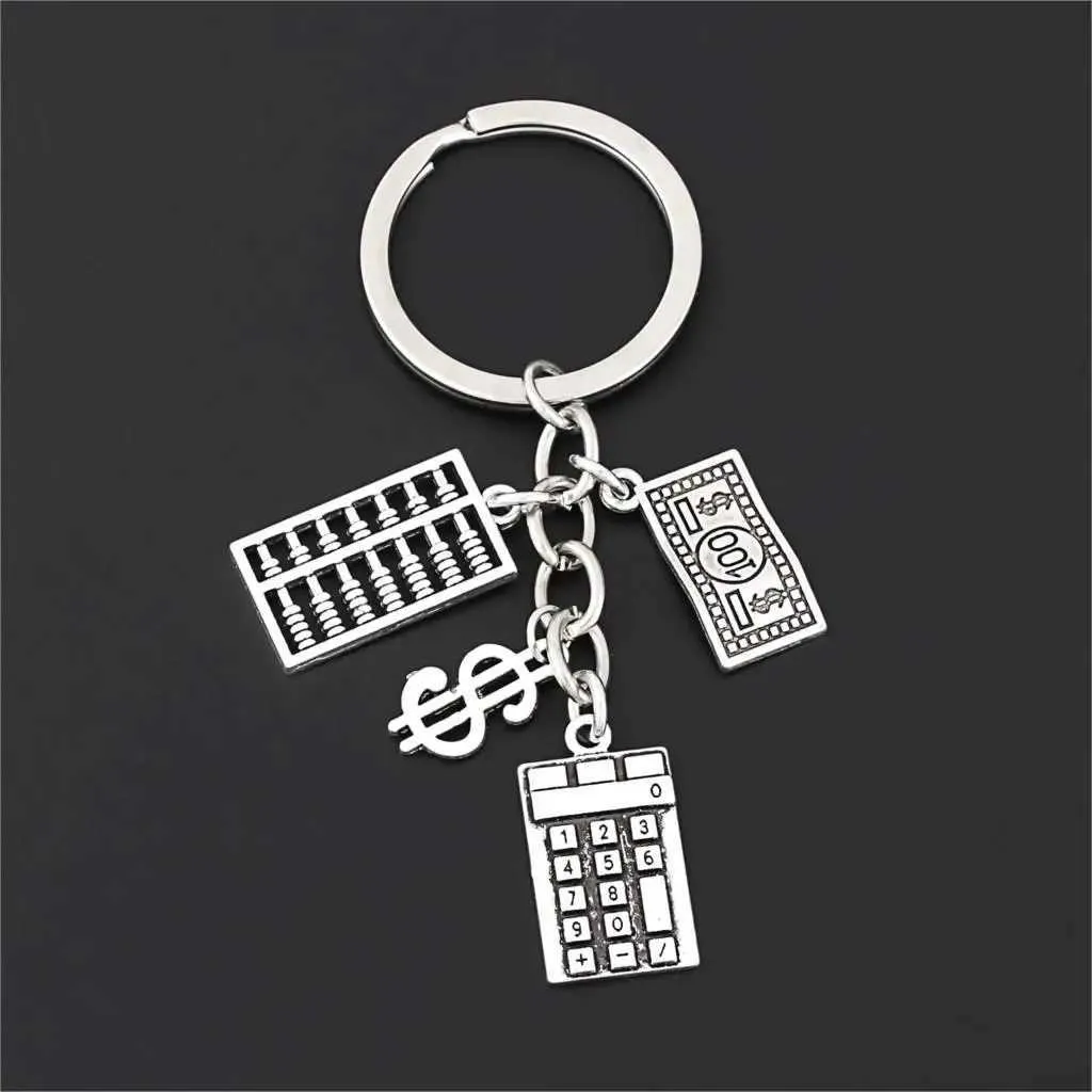 CHIECHAINS Ganyards 1pc Nuovo Calcolatrice arrivata Calcolatrice contabile Keyring da 100 dollari Bill e firma il ciondolo Fit Uomini Regalo per la borsa Gioielli fai da te E2693 Q240403